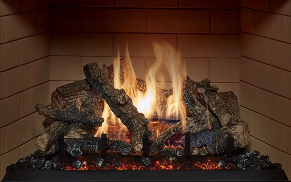 Gas log set burning in a masonry firebox