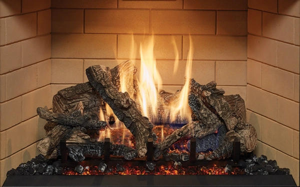 Close view of a gas log set with glowing embers