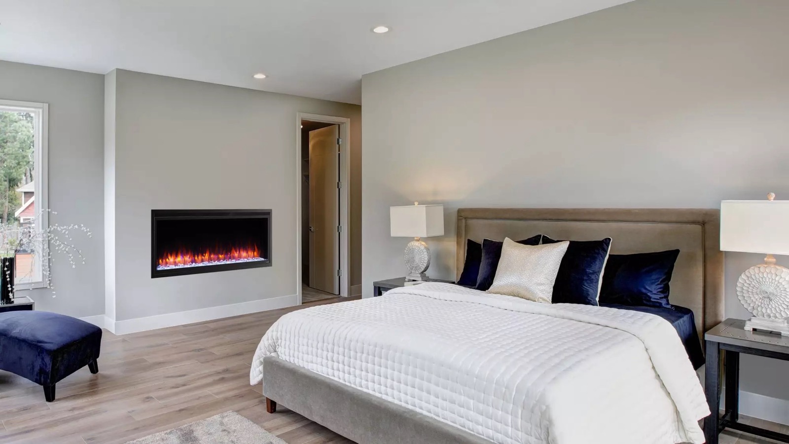 SimpliFire linear electric fireplace in a bedroom wall