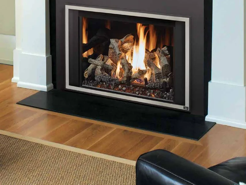 Fireplace Xtrordinair 616 gas insert burning under a white painted mantel